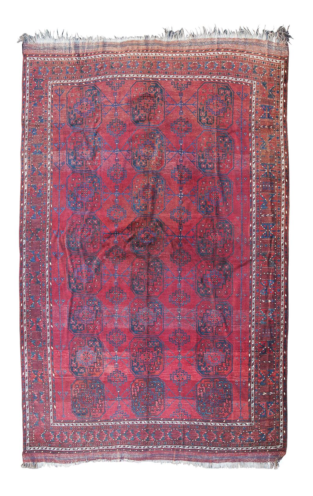 Appraisal: TURKOMAN CARPET TURKMENISTAN TH CENTURY the dark red field with