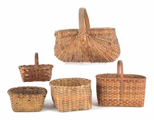 Appraisal: Four splint gathering baskets th c together with a splint