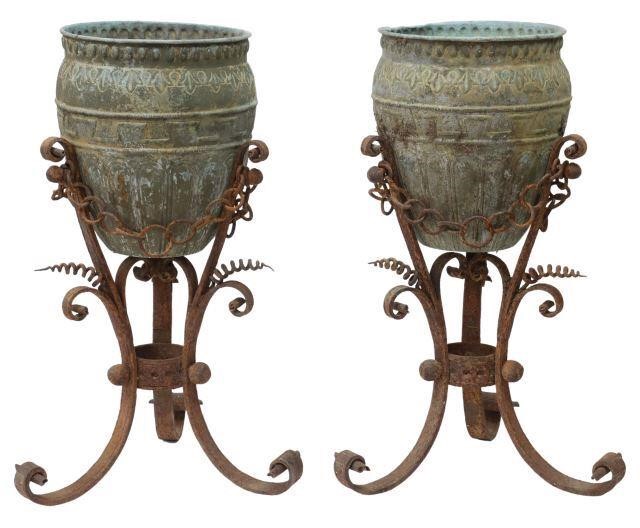 Appraisal: pair Copper and wrought iron planters the copper planters in