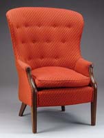 Appraisal: BARREL BACK UPHOLSTERED ARMCHAIR th Century Over upholstered rounded back