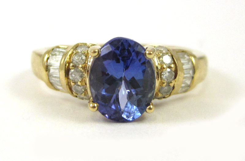 Appraisal: TANZANITE DIAMOND AND FOURTEEN KARAT GOLD RING with five round-cut