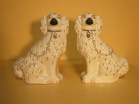 Appraisal: PAIR OF STAFFORDSHIRE SPANIELS Printed marks 'Old Staffordshire Ware' black