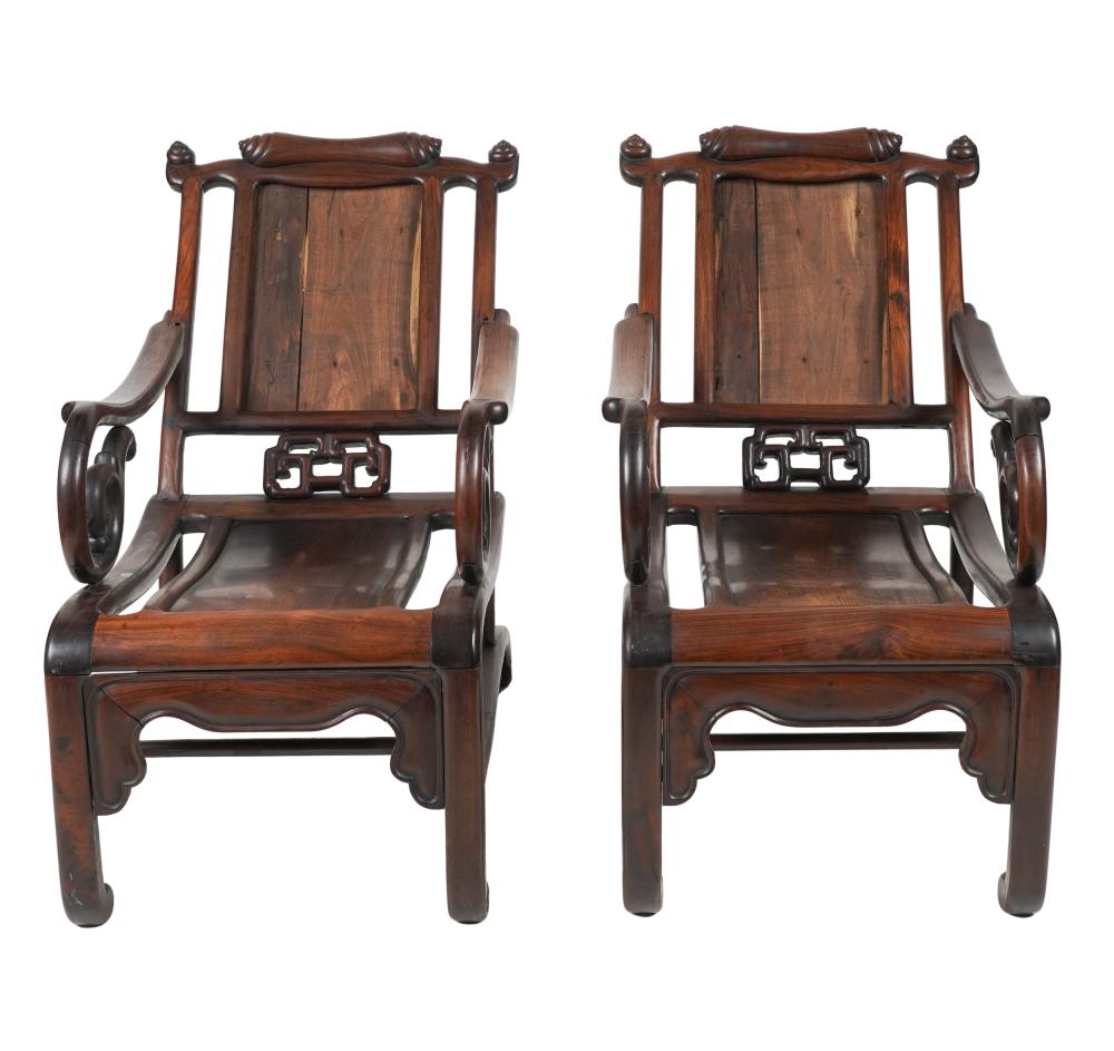 Appraisal: PAIR CHINESE CARVED HARDWOOD MOON CHAIRSCondition loose joints to arms