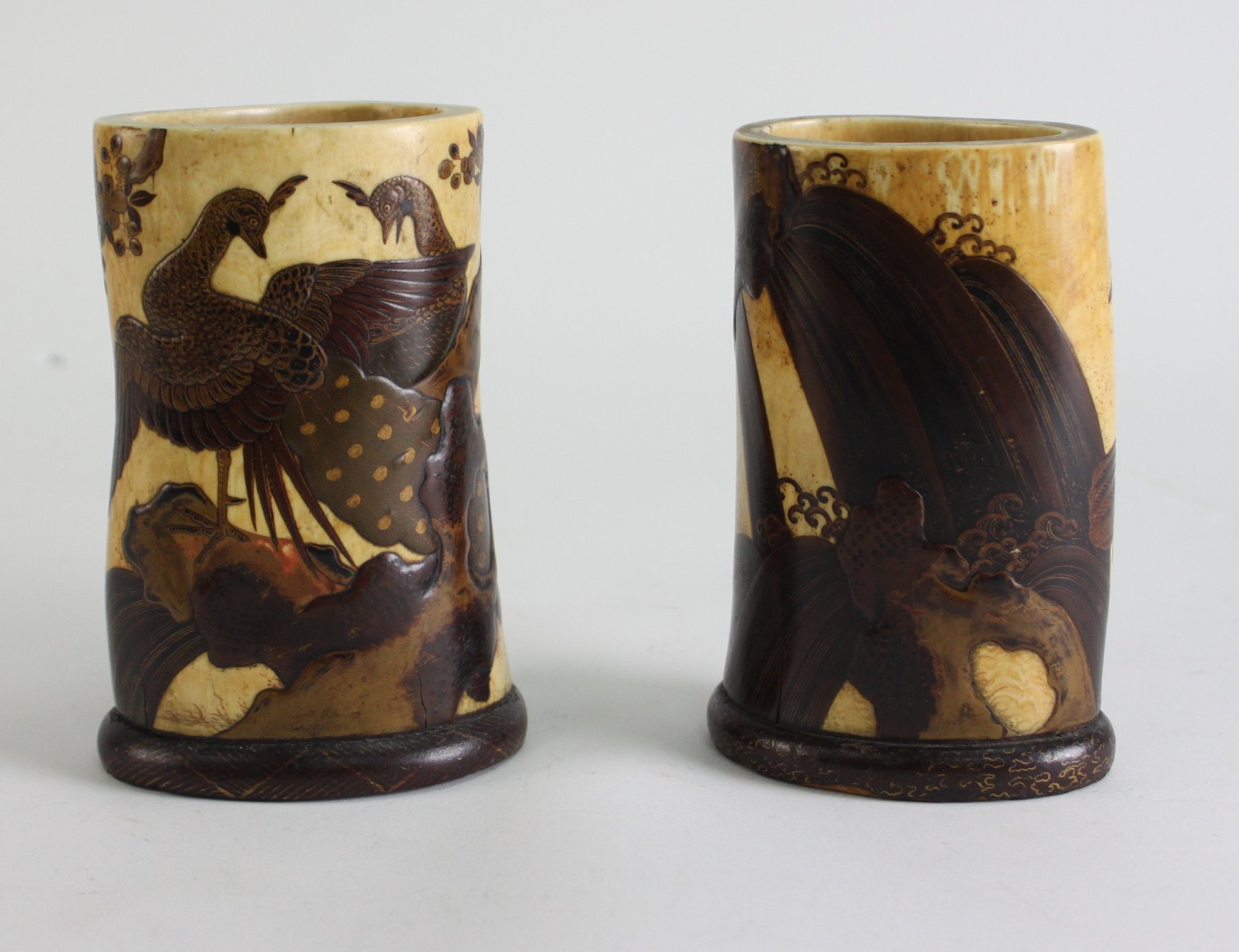 Appraisal: Two Japanese ivory tusk vases Meji period with lacquered decoration