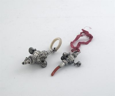 Appraisal: Two rattles a tiny embossed example with coral teether and