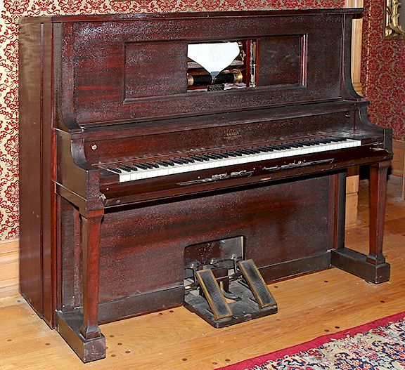 Appraisal: Angelus Player Piano AngelusPlayer piano with over rolls No bench