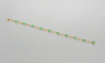 Appraisal: A Ladies' Delicate Jade and Gold Bracelet k yellow gold