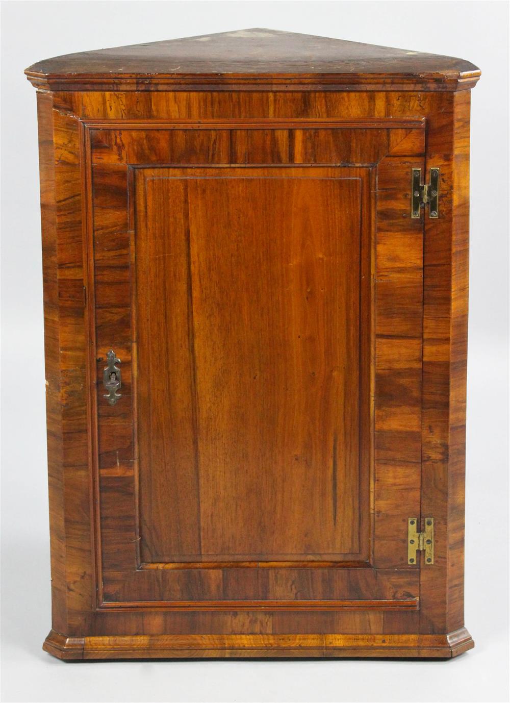 Appraisal: REGENCY MAHOGANY DIMINUTIVE HANGING CORNER CUPBOARD having a molded top