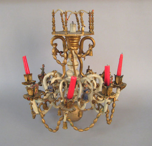 Appraisal: German carved wood and painted eight-arm chandelier th c retaining