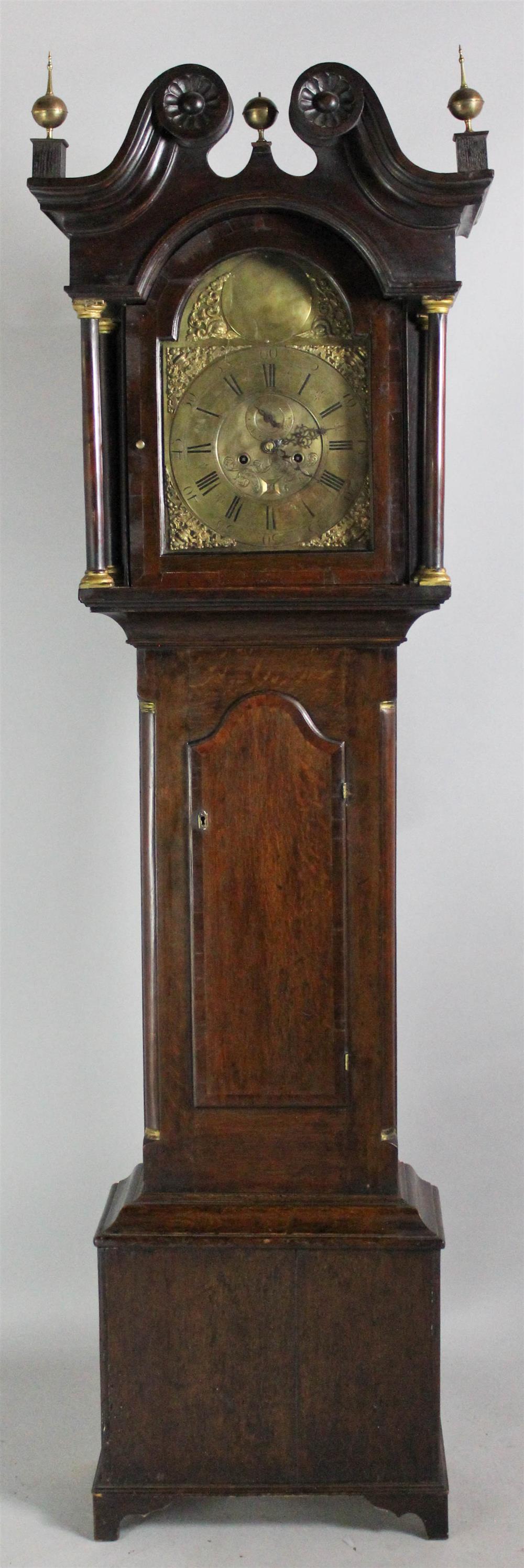 Appraisal: GEORGIAN ENGLISH OAK TALL CASE CLOCK having a shaped and