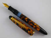 Appraisal: A German Senator pen in marbled yellow and black with