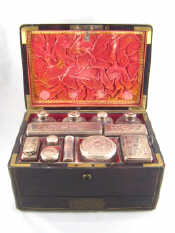 Appraisal: A ladies brass bound rosewood William IV dressing case with