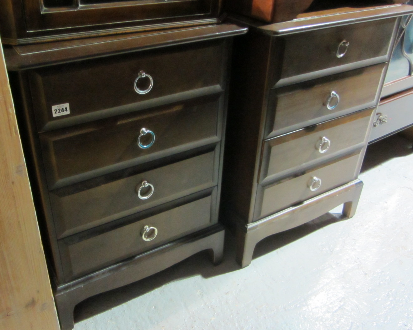 Appraisal: A pair of th century four drawer bedside chests