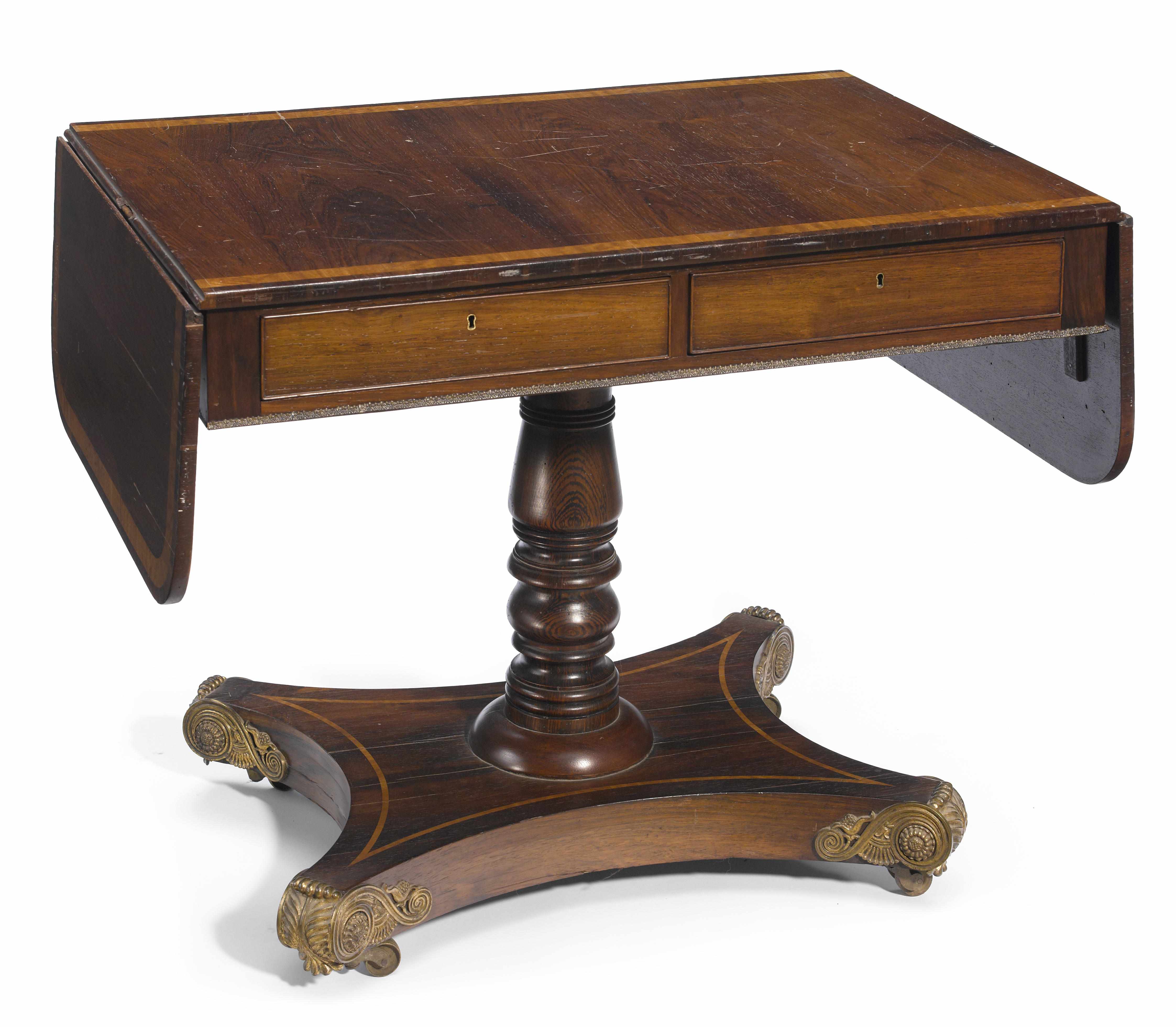 Appraisal: A Regency inlaid rosewood sofa table early th century The