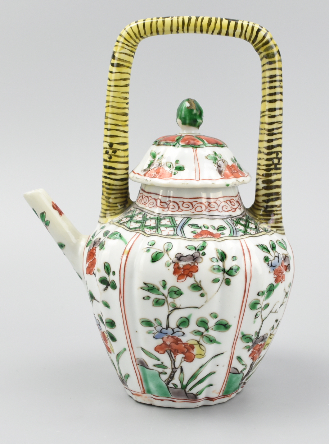 Appraisal: CHINESE FLUTED WUCAI TEAPOT AND COVER KANGXI P The body