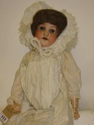 Appraisal: A Heubach Koppelsdorf bisque head doll with blue lashed sleeping