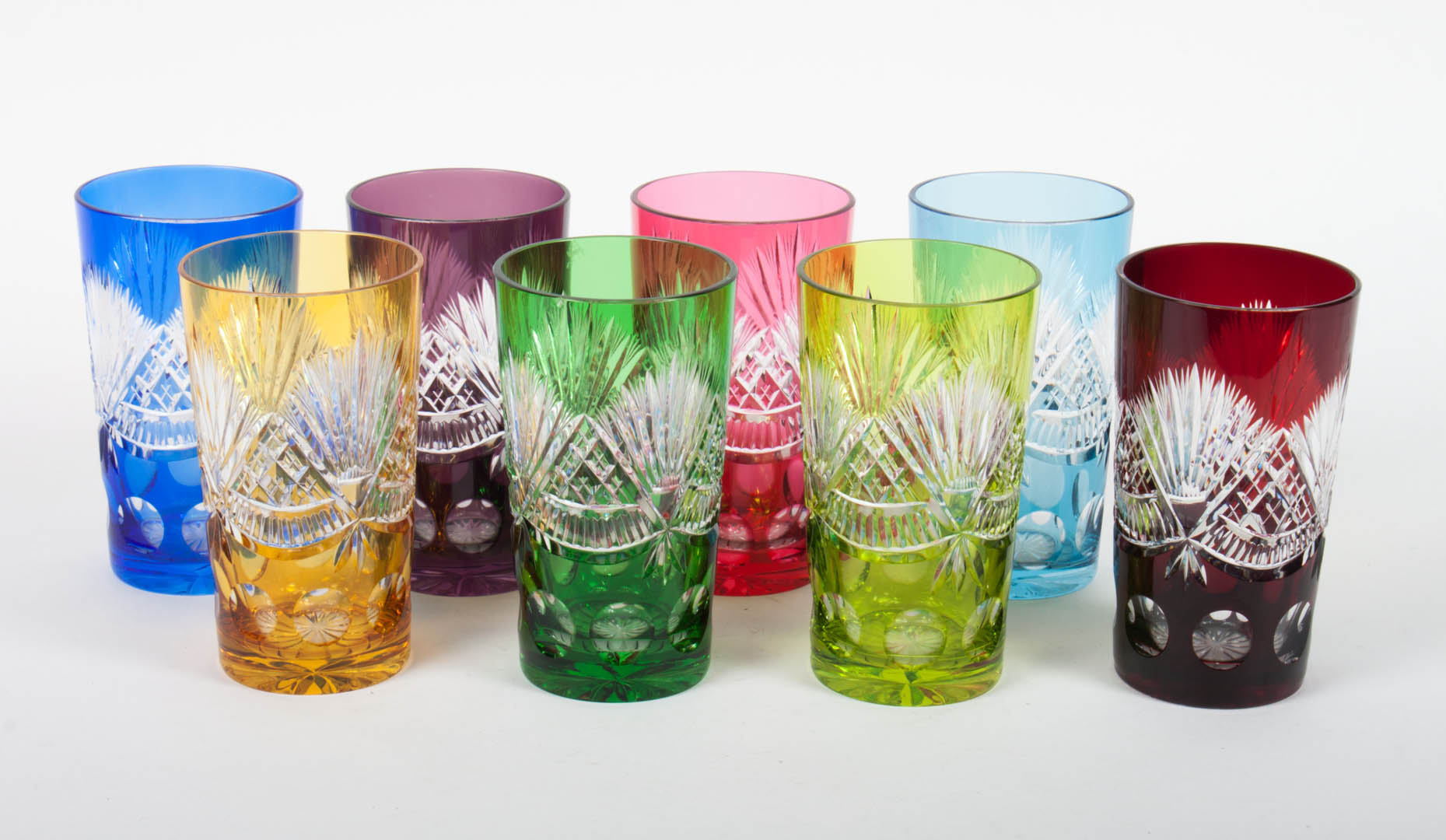 Appraisal: Eight Czecho-Bohemian glass tumblers colored cut-to-clear H