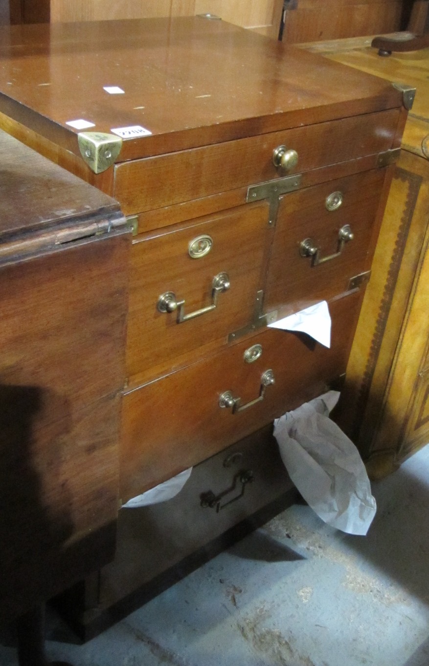 Appraisal: A th century tall walnut chest with an arrangement of