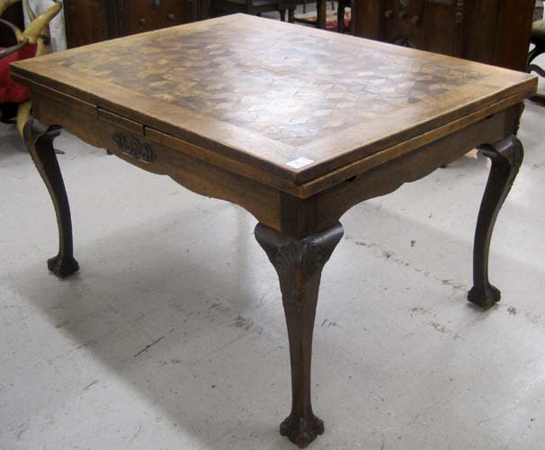 Appraisal: CHIPPENDALE STYLE OAK DRAW-LEAF DINING TABLE Continental c having rectangular