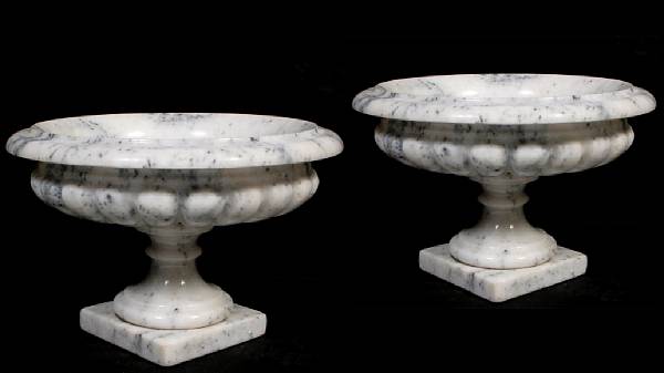 Appraisal: A pair of carved travertine marble tazzas height in diameter