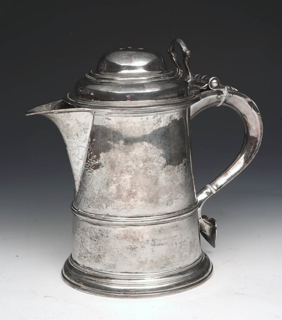 Appraisal: A GEORGIAN LIDDED TANKARD of tapering circular form with stylised