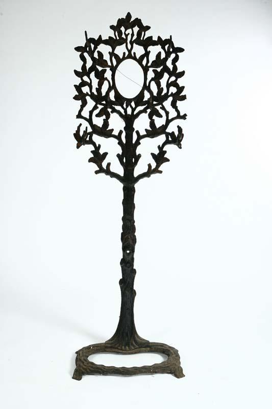 Appraisal: CAST IRON COAT RACK Tree form with a tree trunk