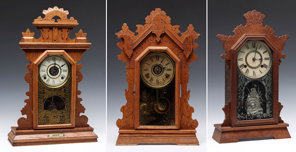 Appraisal: THREE FANCY OAK AND WALNUT FANCY PARLOR CLOCKS The three