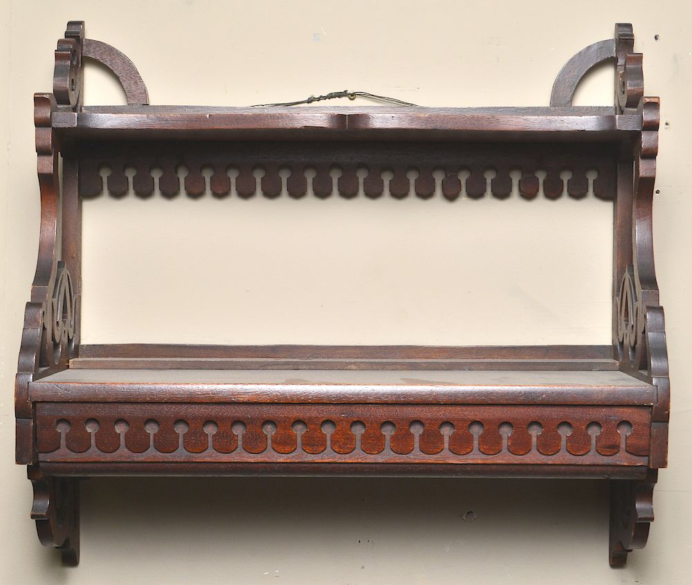 Appraisal: American Aesthetic Movement Hanging Shelf American Aesthetic Movement mahogany two-tiered