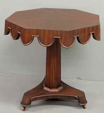 Appraisal: Deco style rosewood center table with a shaped circular top