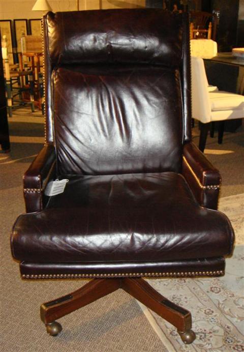 Appraisal: SUPPLE BURGANDY LEATHER SWIVEL OFFICE CHAIR h w d in