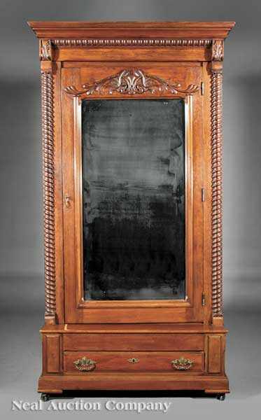 Appraisal: An American Carved Walnut Armoire late th c stepped cornice