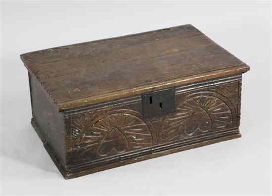 Appraisal: A late th century carved oak bible box dated and