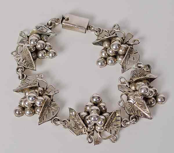 Appraisal: Mexican Silver Bracelet Mexican a sterling silver bracelet with clusters