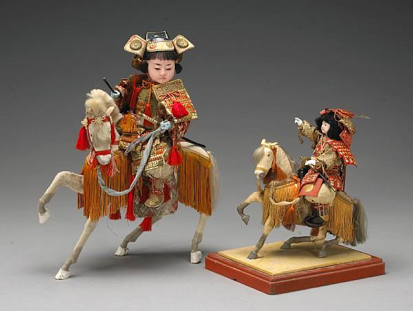 Appraisal: Two musha ningyo warrior dolls th Century Each depicting a