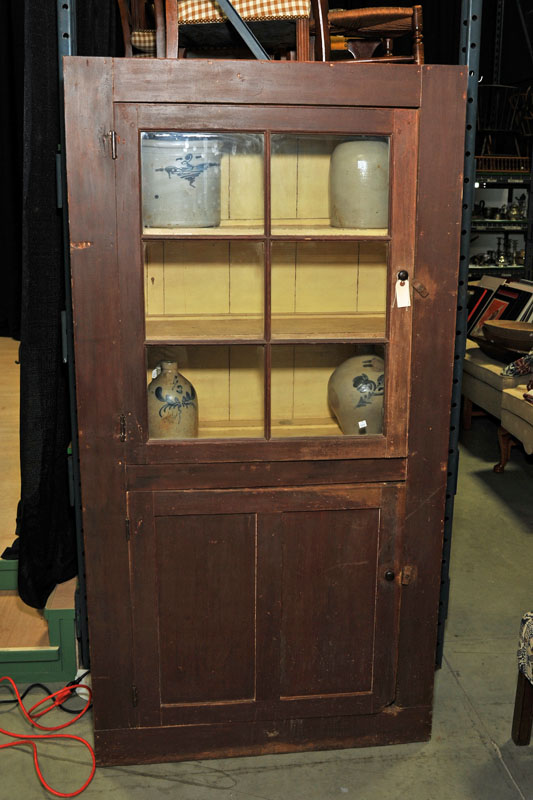 Appraisal: WALL CUPBOARD Brown stained square nail constructed cupboard with six