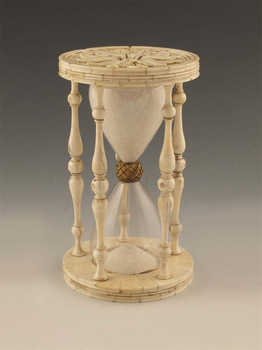 Appraisal: A marine ivory and bone hour glass