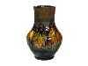 Appraisal: A MOORCROFT FLAMB GRAPE AND LEAF VASE DESIGNED BY WILLIAM