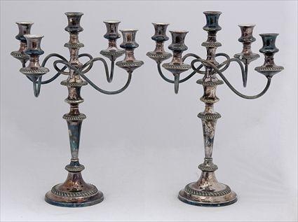 Appraisal: PAIR OF ENGLISH SILVER-PLATED CANDLESTICKS WITH REMOVABLE FIVE-LIGHT ARMS Each