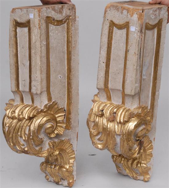 Appraisal: PAIR CARVED NEOCLASSICAL SUPPORTS Carved gessoed and parcel gilt wood