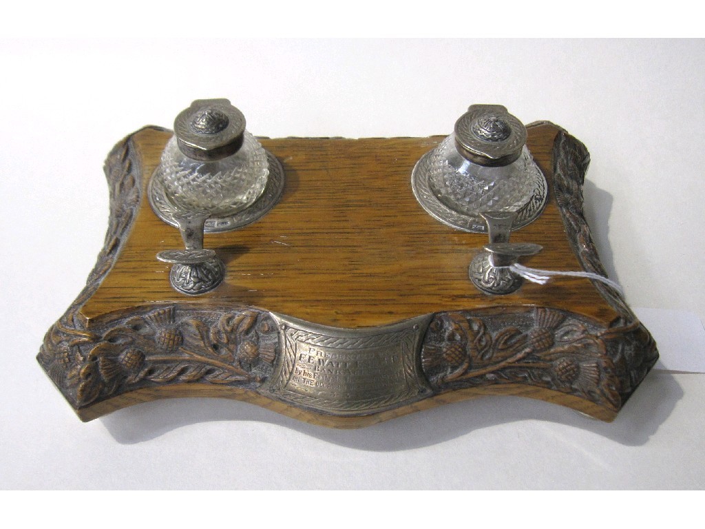 Appraisal: Provincial silver mounted oak inkstand with thistle carving marks for