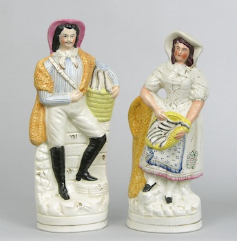 Appraisal: A Pair of Staffordshire Fishmonger Figurines A handsome pair of