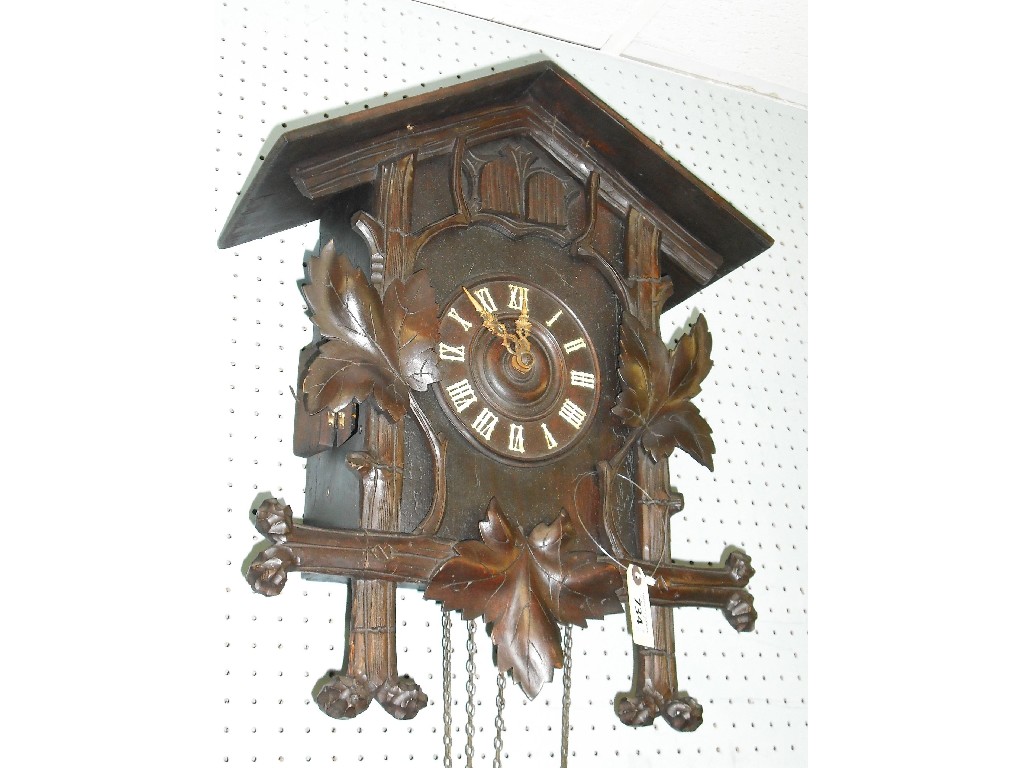 Appraisal: Black Forest three train quail and double cuckoo wall clock