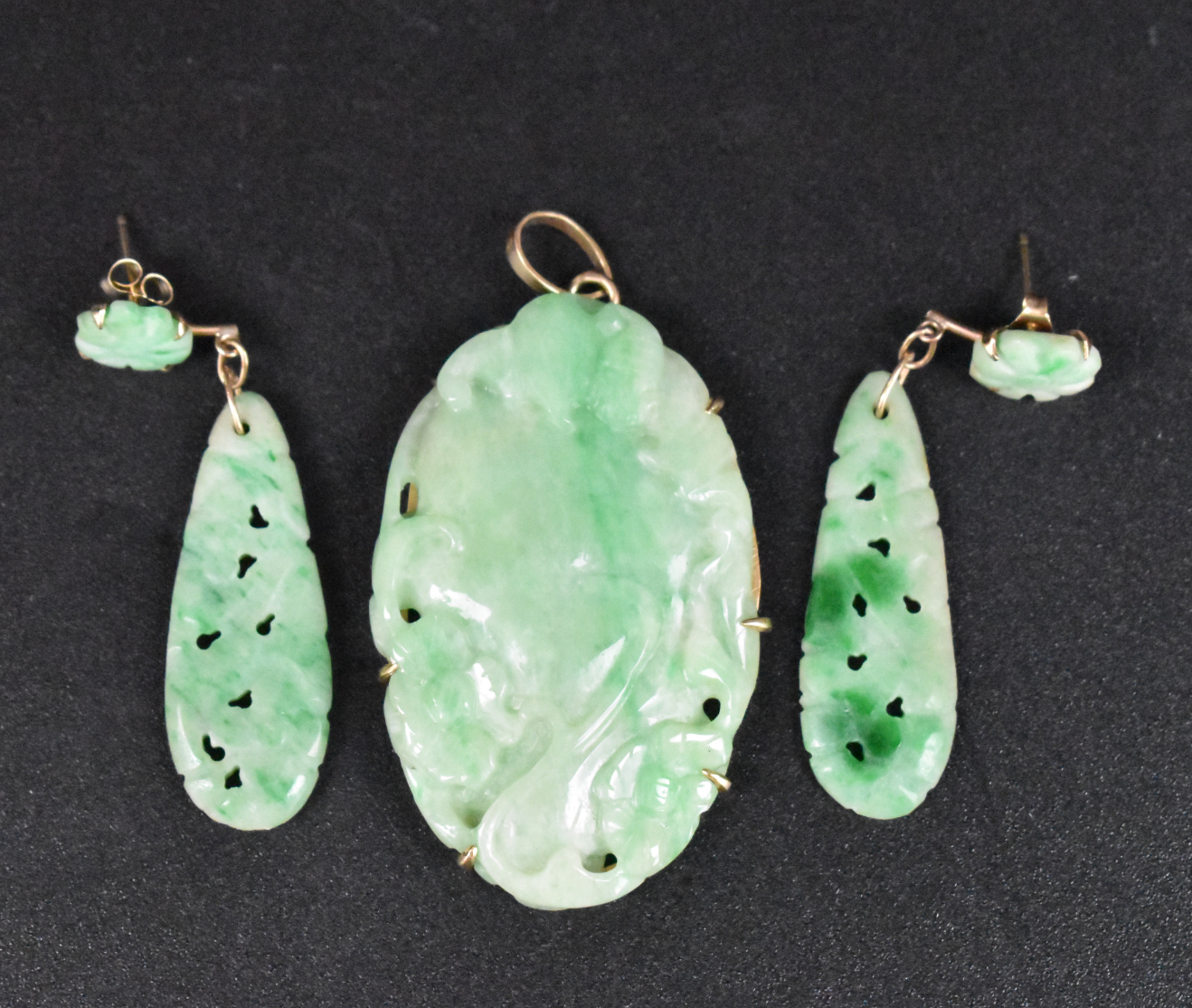 Appraisal: A pair of Chinese jadeite earrings and a jadeite carved