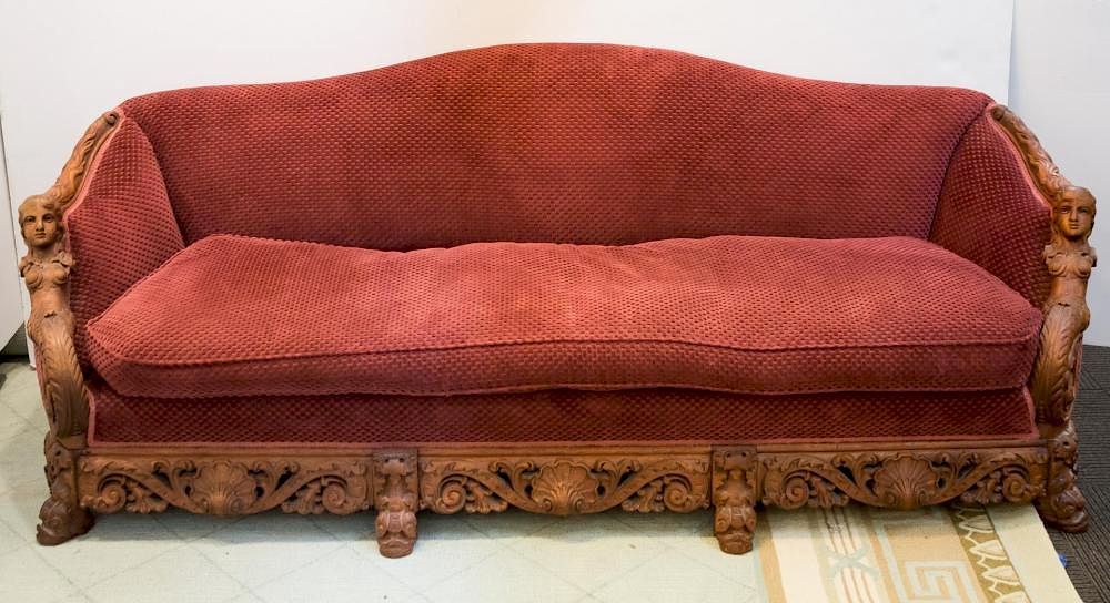 Appraisal: Victorian Revival Carved Wood Upholstered Sofa Victorian Revival carved wood