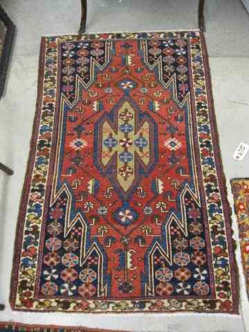 Appraisal: Hamadan Persian Handmade Rug geometric stylized floral red blues browns