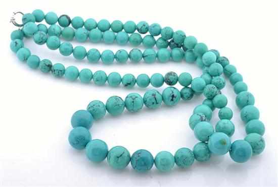 Appraisal: A DOUBLE STRAND OF GRADUATED TURQUOISE BEADS