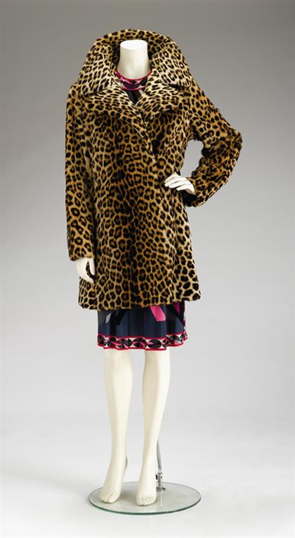 Appraisal: Leopard fur coat s Classic stroller coat with a large