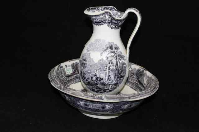 Appraisal: A DAVENPORT GENOA PATTERN JUG AND BOWL SET the jug