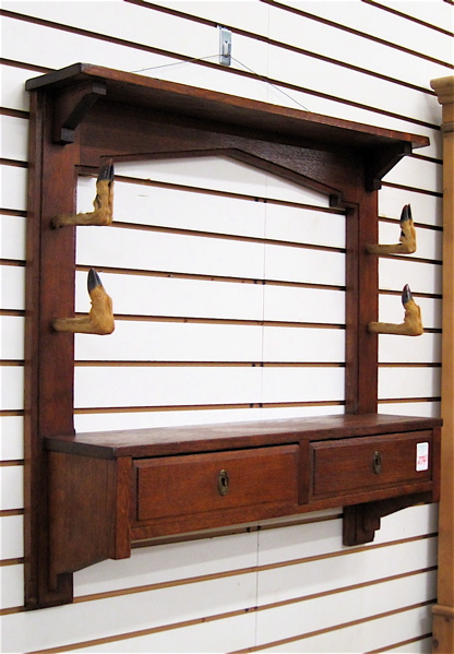 Appraisal: AN OAK WALL-MOUNT GARMENT RACK WITH DRAWERS American c of