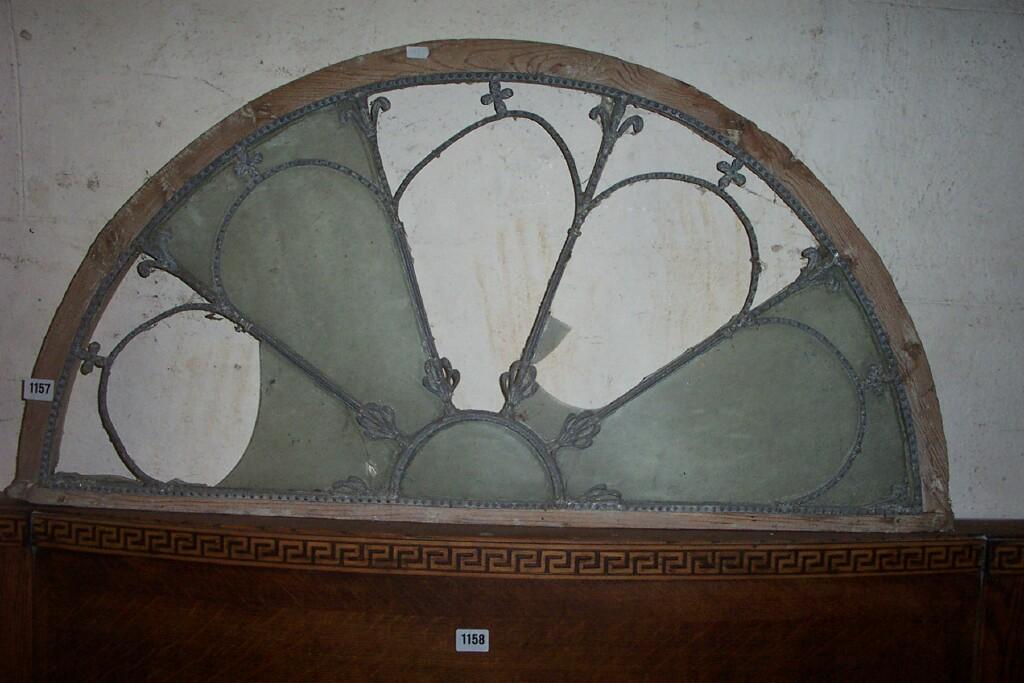 Appraisal: A Georgian pine framed fan light with leaded light panel